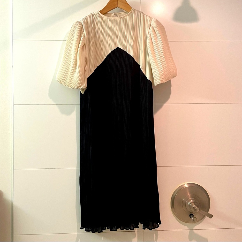 Vintage pleated dress with puff sleeves